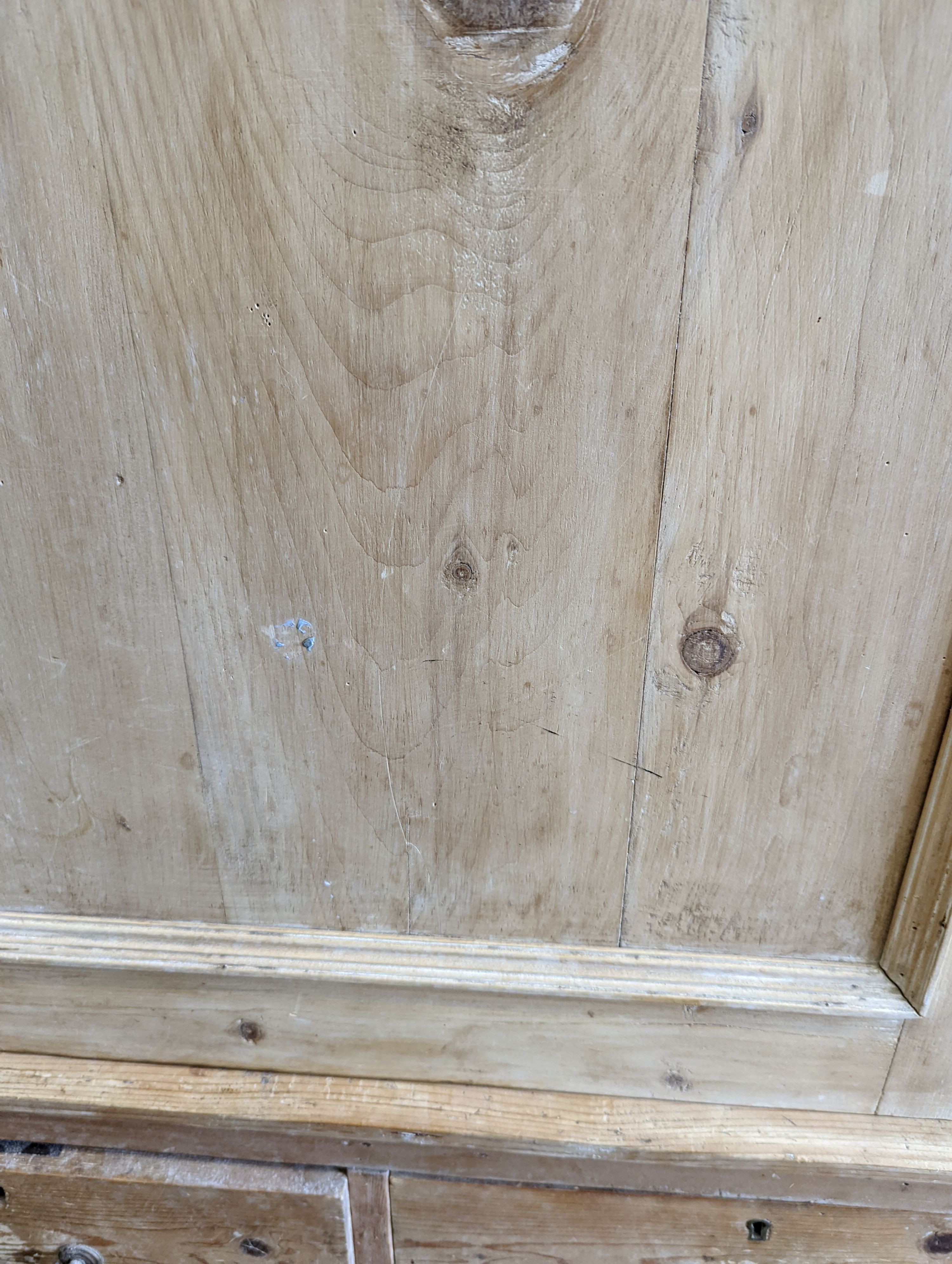An Edwardian pine kitchen cupboard with five drawer base, width 94cm, height 193cm